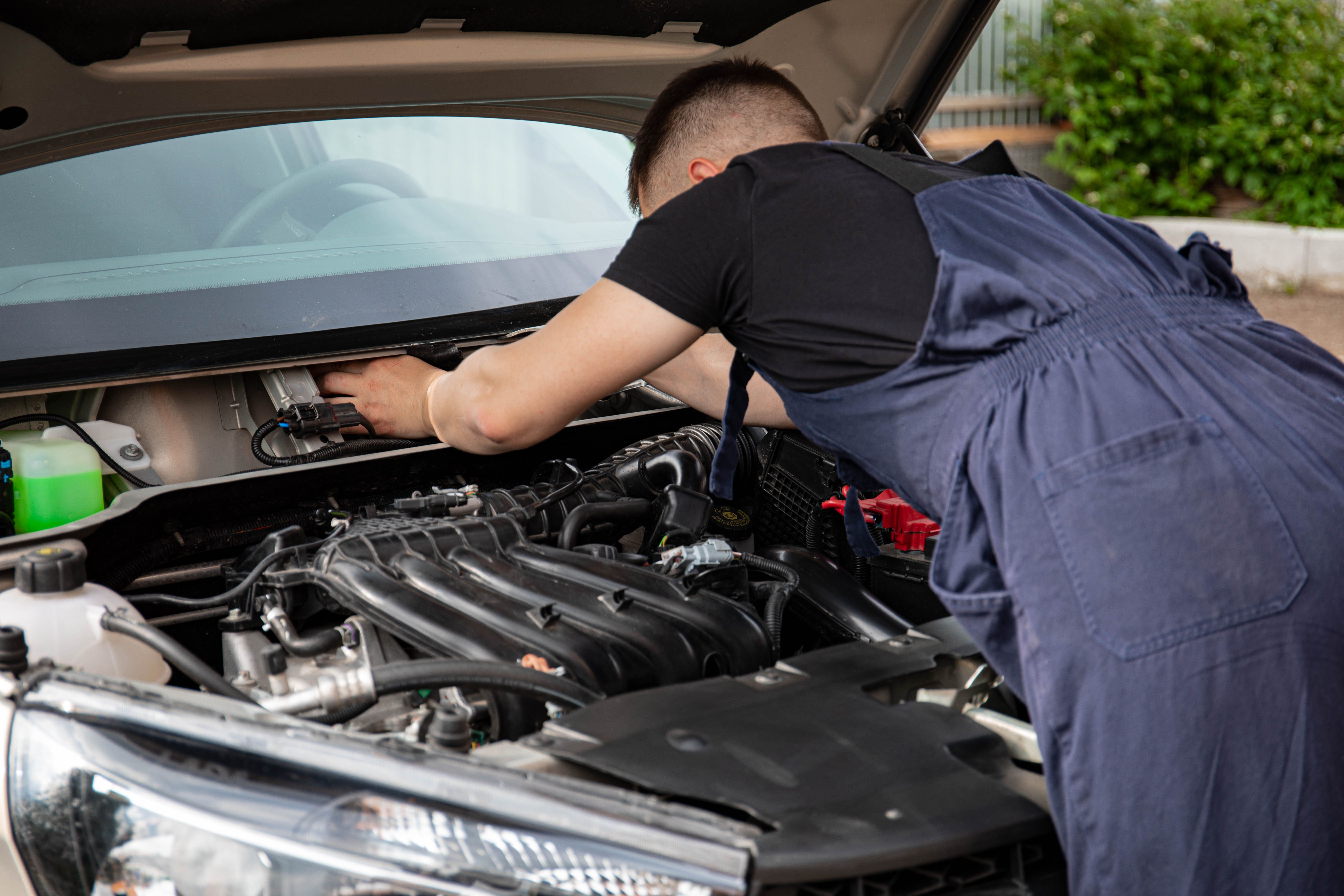 Mechanic working on a car from Jumeirah Islands